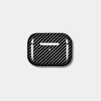 Classic Black Karbon™ 2x2 Twill Woven Carbon Fiber AirPods Case front view showing the high-gloss composite finish.