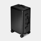 Karbon™ Lightweight Carbon Fiber 20-inch and 24-inch hardside spinner suitcases featuring a reinforced aluminum frame and dual TSA locks on a studio background.