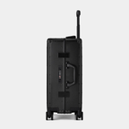 Karbon™ Lightweight Carbon Fiber 20-inch and 24-inch hardside spinner suitcases featuring a reinforced aluminum frame and dual TSA locks on a studio background.