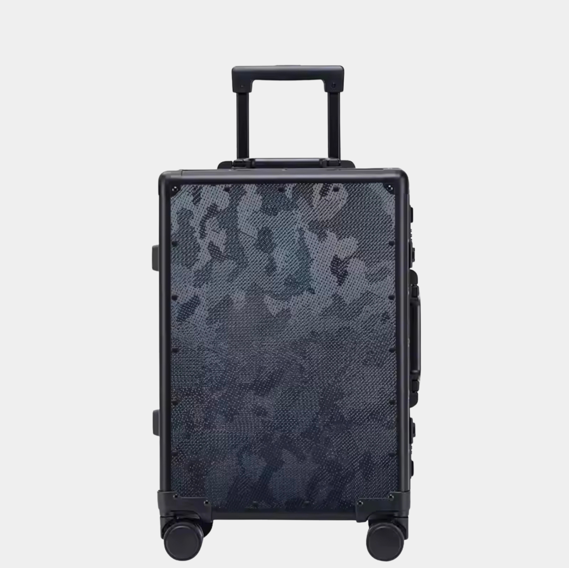 Karbon™ Lightweight camo Carbon Fiber 20-inch and 24-inch hardside spinner suitcases featuring a reinforced aluminum frame and dual TSA locks on a studio background.
