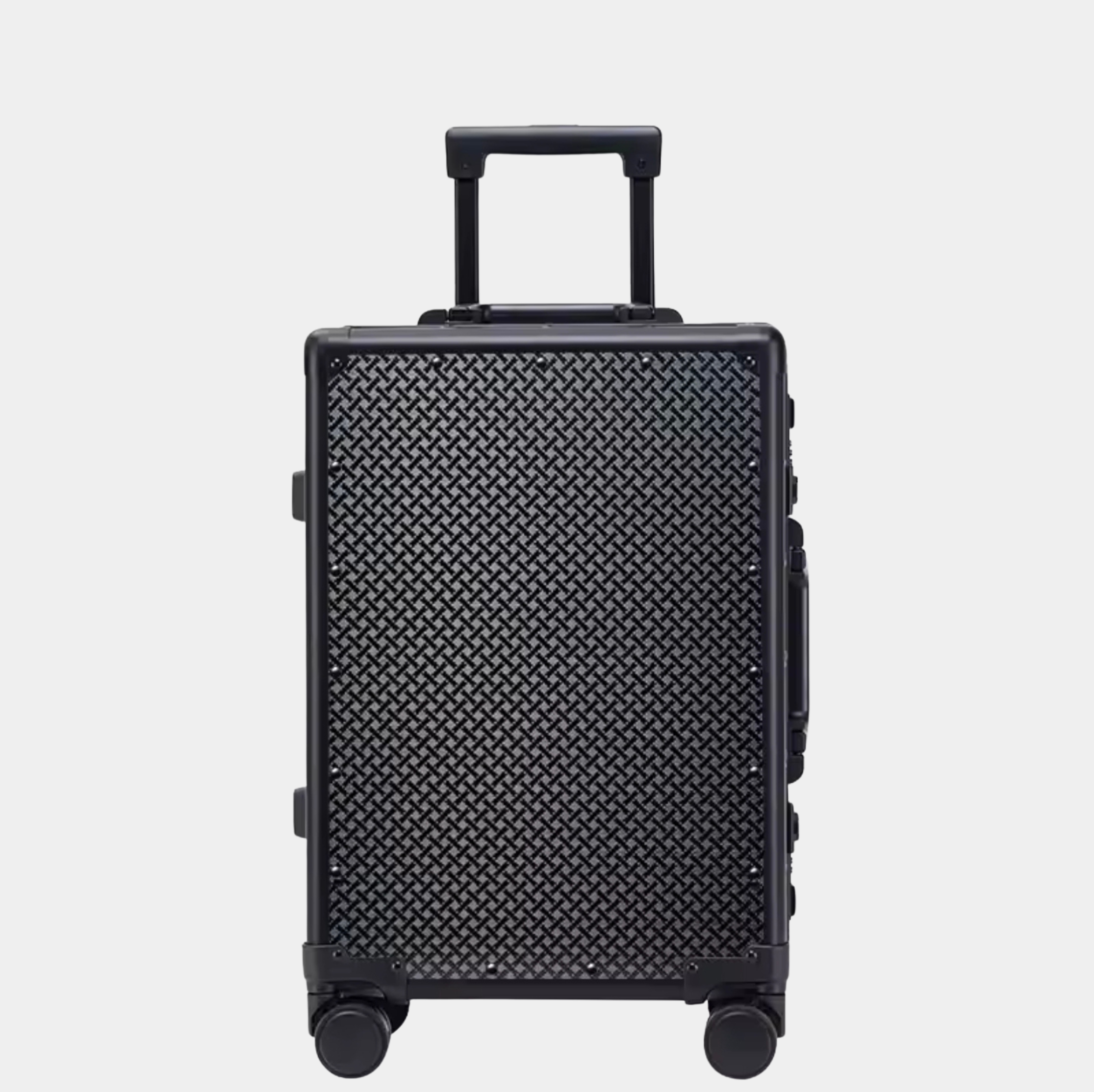 Karbon™ Lightweight grid Carbon Fiber 20-inch and 24-inch hardside spinner suitcases featuring a reinforced aluminum frame and dual TSA locks on a studio background.