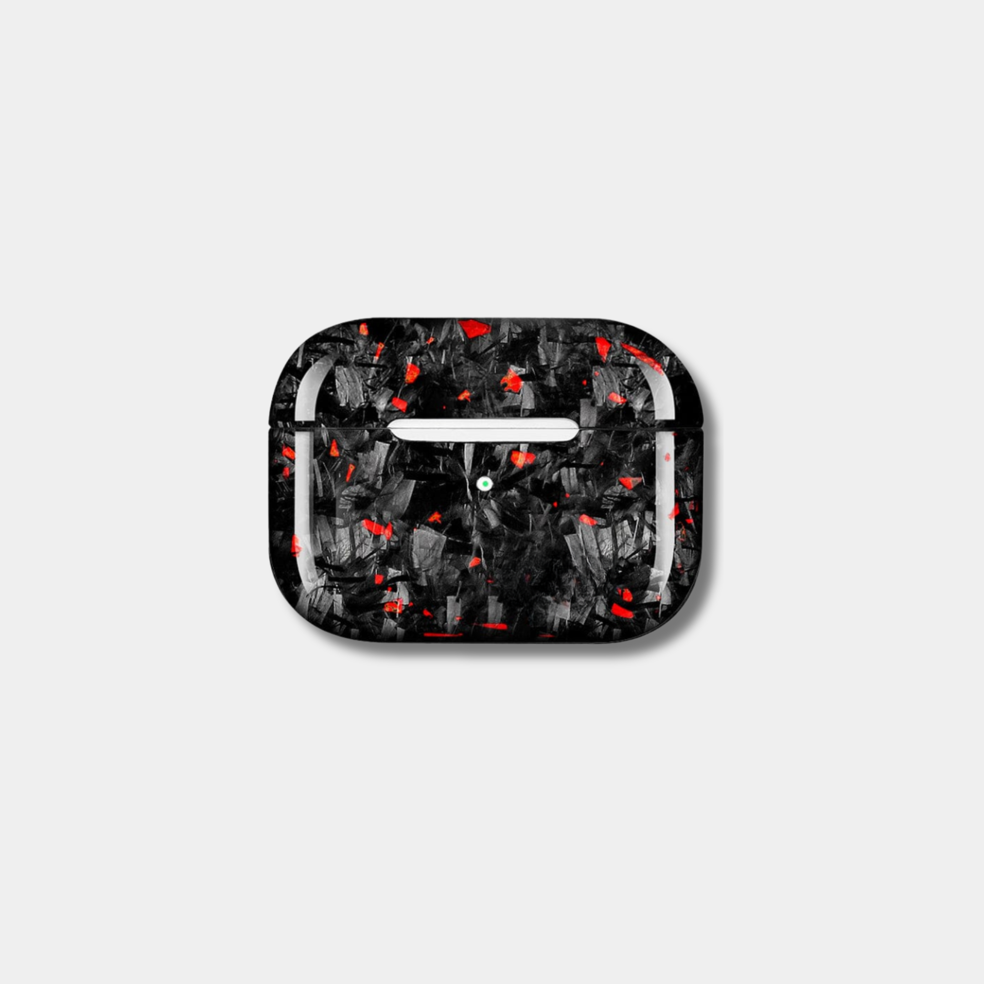 Apple AirPods case made from genuine forged carbon fiber with vibrant red specks by Karbon Technik, displaying a high-gloss marbled composite finish.