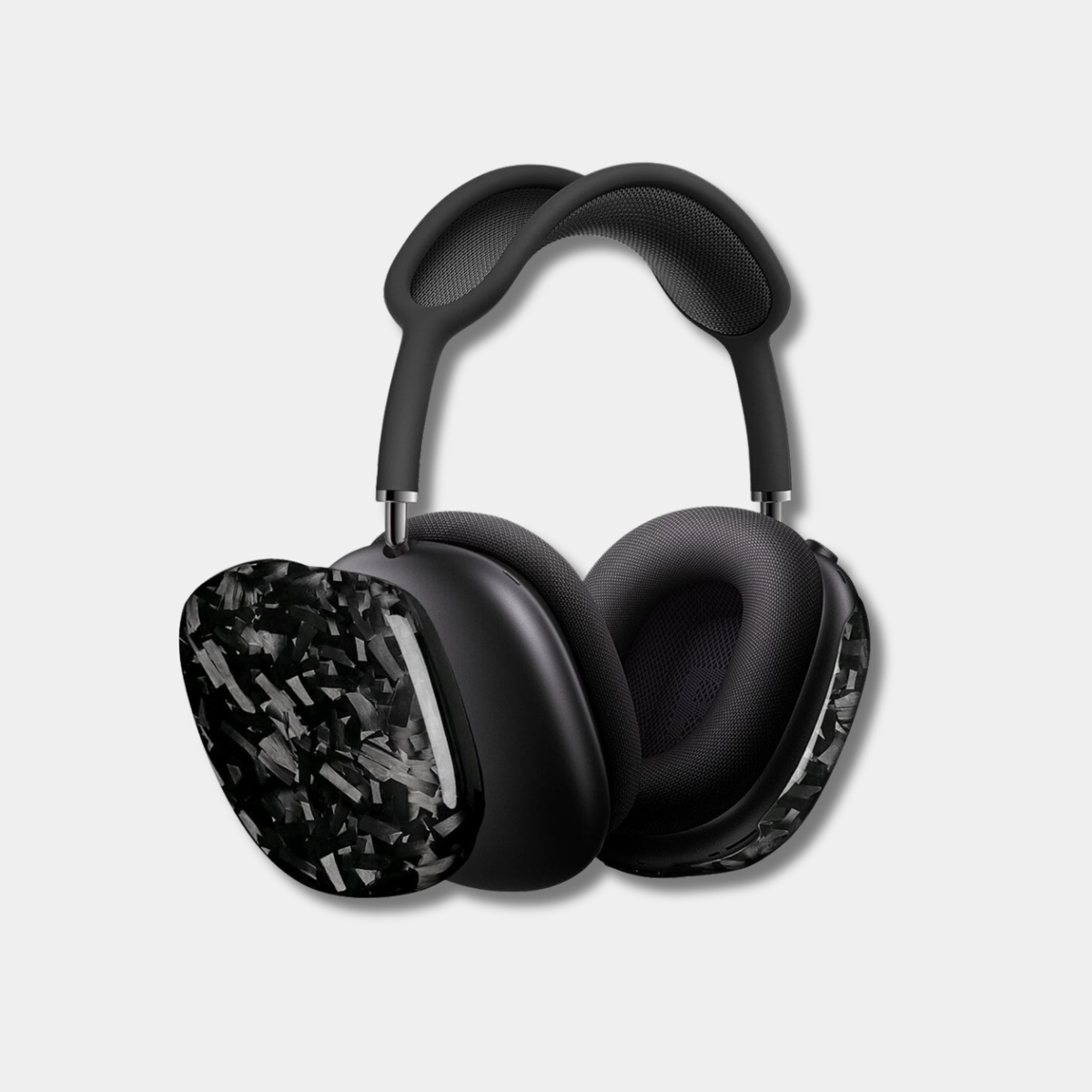 Apple AirPods Max black forged carbon fiber covers by Karbon Technik, showcasing a high-gloss marbled composite finish.