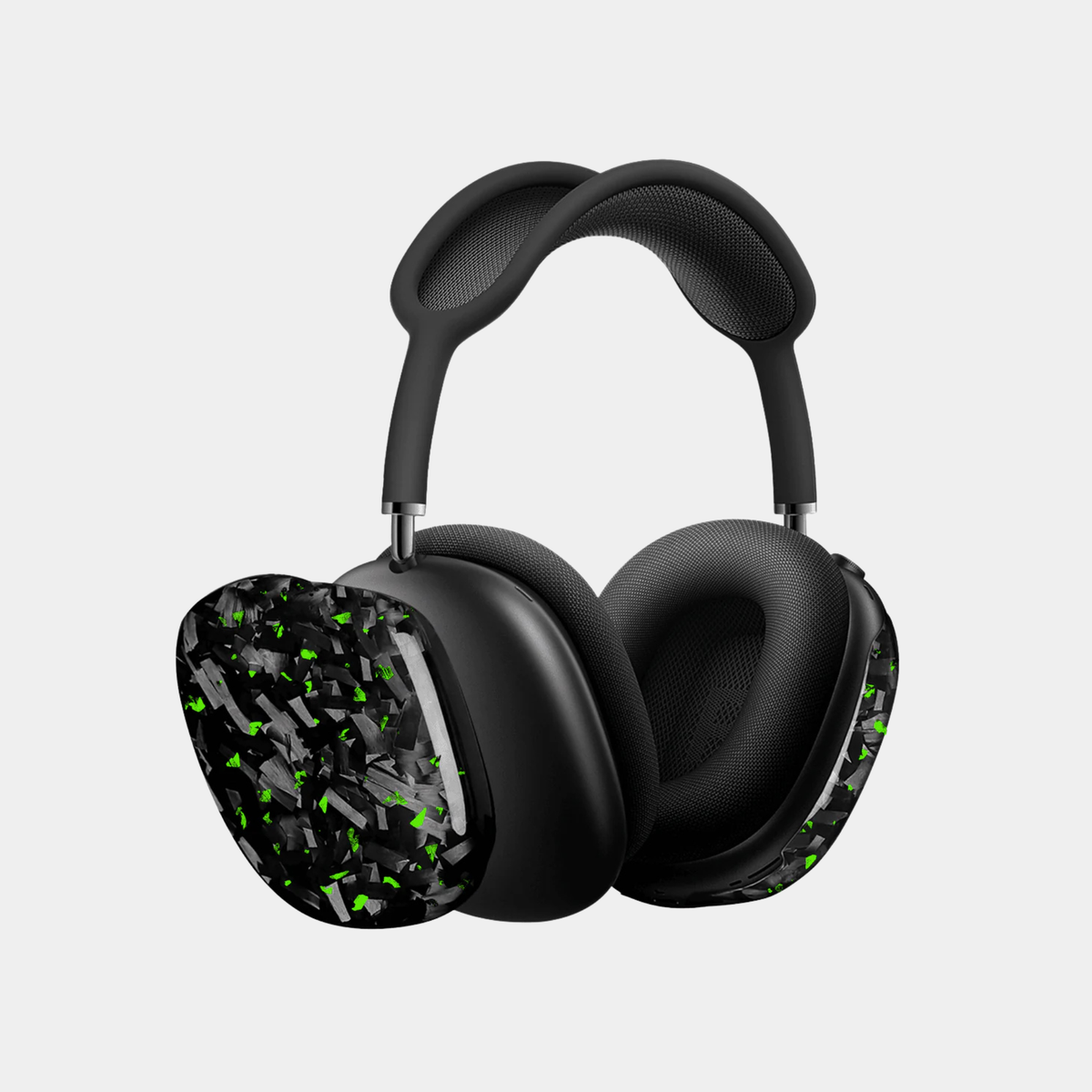 Apple AirPods Max with green-accented forged carbon fiber covers by Karbon Technik, showcasing a high-gloss marbled composite finish.