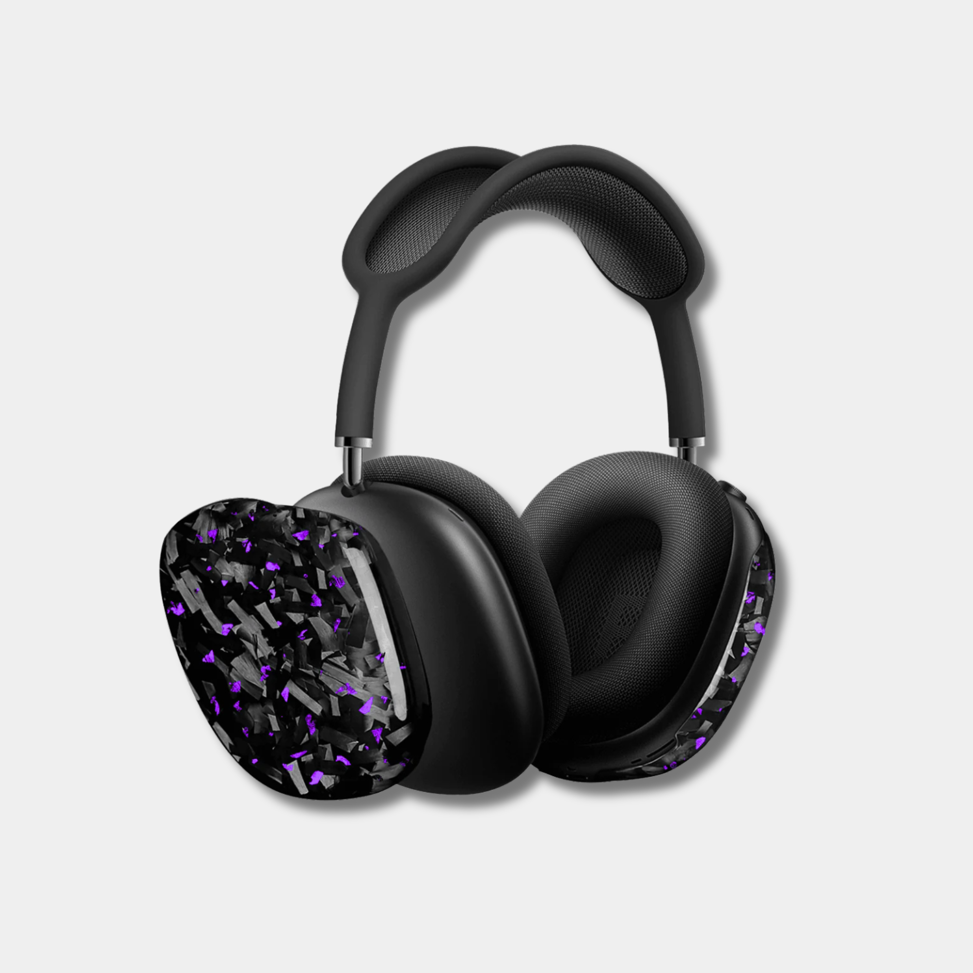 Apple AirPods Max with purple-accented forged carbon fiber covers by Karbon Technik, showcasing a high-gloss marbled composite finish.