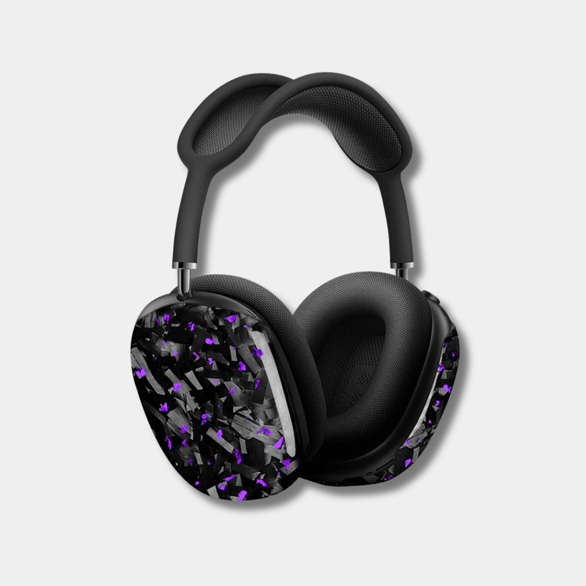 Apple AirPods Max with purple-accented forged carbon fiber covers by Karbon Technik, showcasing a high-gloss marbled composite finish.