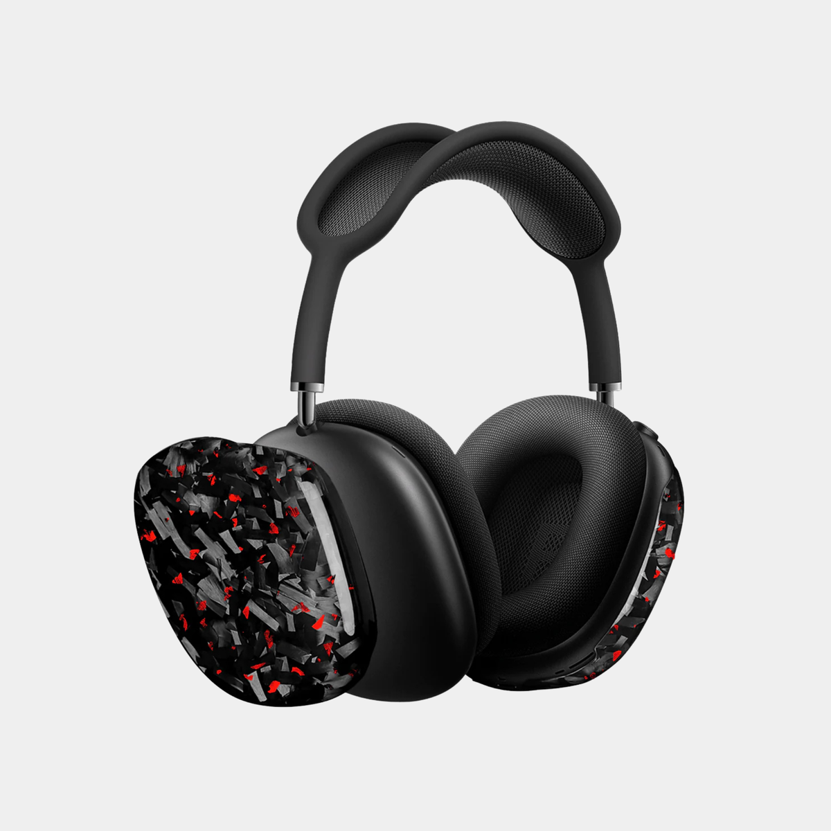 Apple AirPods Max with red-accented forged carbon fiber covers by Karbon Technik, showcasing a high-gloss marbled composite finish.