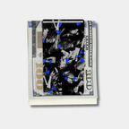 Forged Karbon™ money clip in black composite with blue accents holding bills by Karbon Technik.