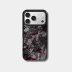 Genuine forged carbon fiber iPhone case by Karbon Technik, featuring vibrant red flakes, protective raised edges, and MagSafe compatibility.