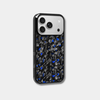 Genuine raw carbon fiber iPhone case by Karbon Technik, featuring vibrant blue flakes, protective raised edges, and MagSafe compatibility. 