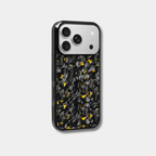 Genuine raw carbon fiber iPhone case by Karbon Technik, featuring vibrant gold flakes, protective raised edges, and MagSafe compatibility.  