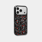 Genuine raw carbon fiber iPhone case by Karbon Technik, featuring vibrant red flakes, protective raised edges, and MagSafe compatibility.  