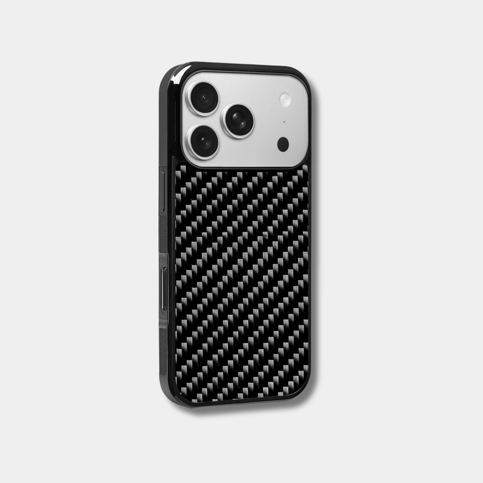 Black woven carbon fiber iPhone case by Karbon Technik with raised camera bezel and high-impact protective TPU frame.