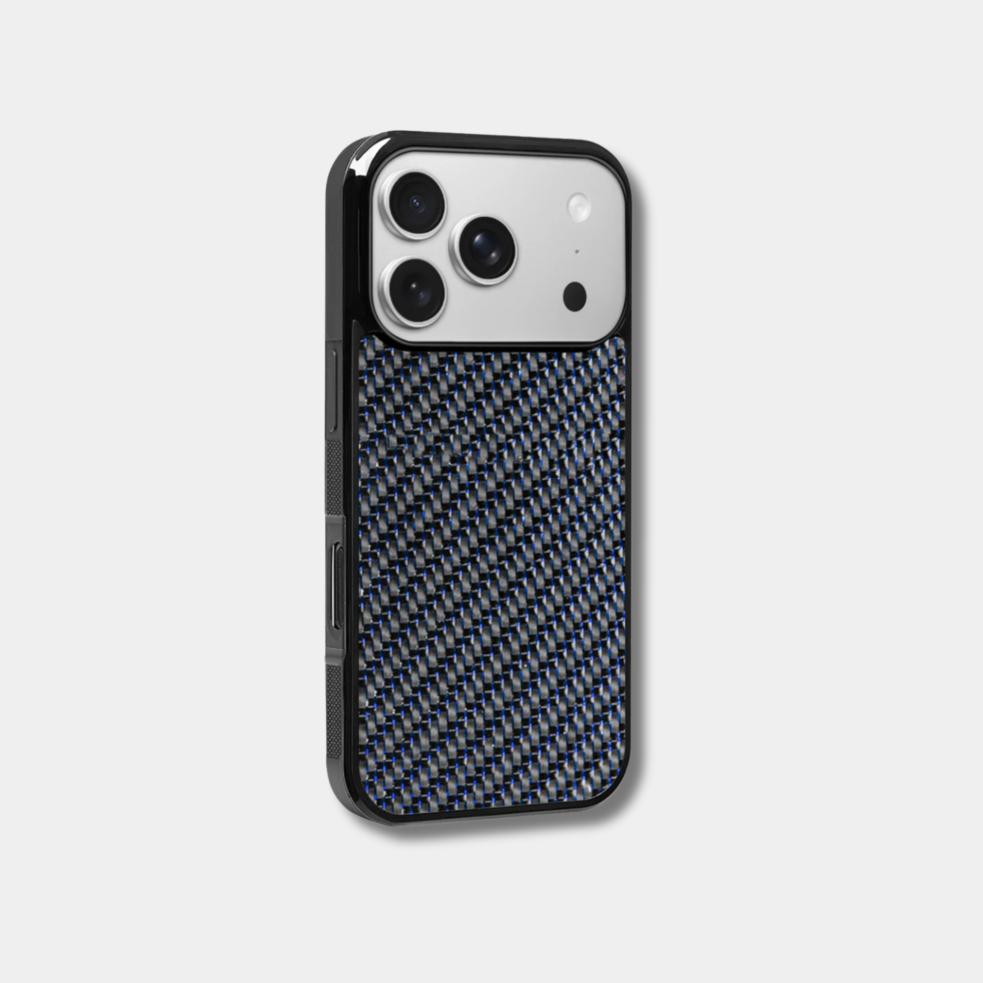 Blue-accented woven carbon fiber iPhone case by Karbon Technik with raised camera bezel and high-impact protective TPU frame.