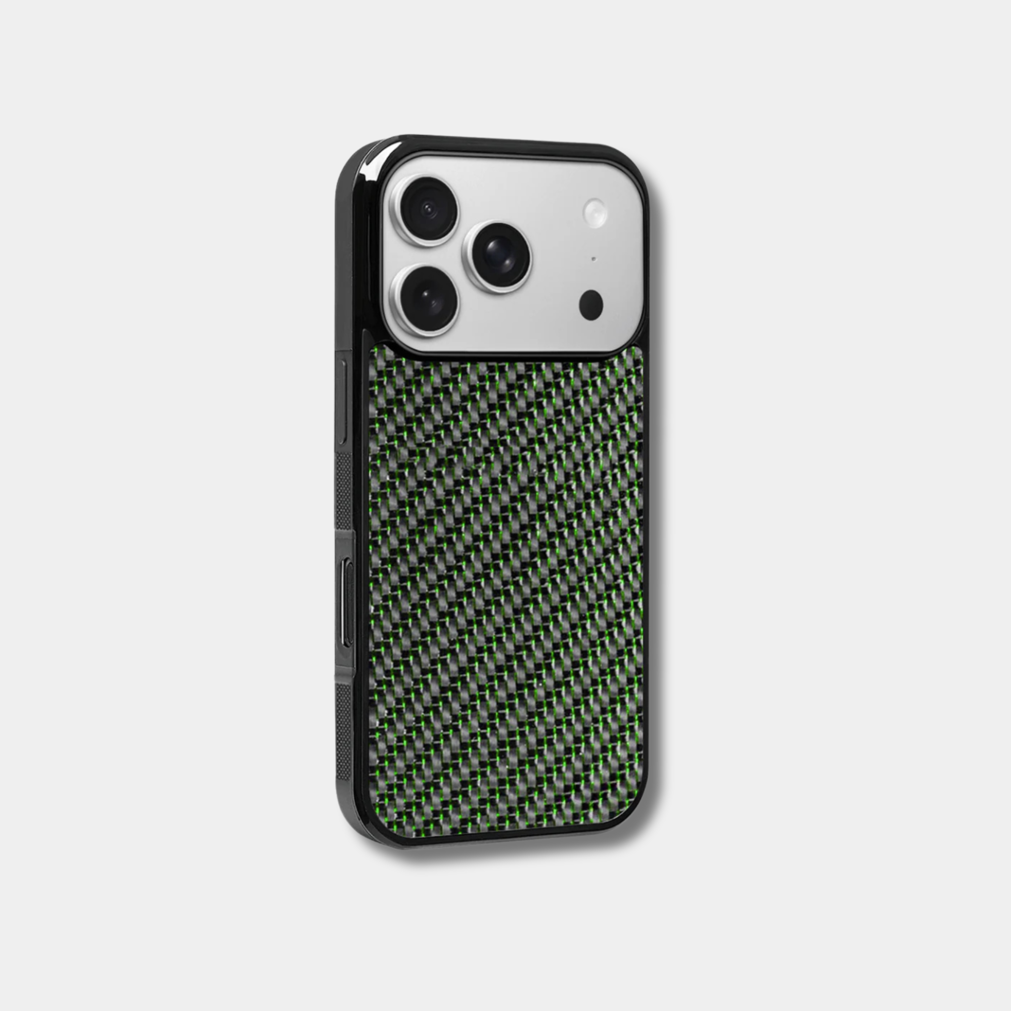 Green-accented woven carbon fiber iPhone case by Karbon Technik with raised camera bezel and high-impact protective TPU frame.