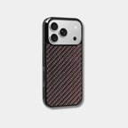 Red-accented woven carbon fiber iPhone case by Karbon Technik with raised camera bezel and high-impact protective TPU frame.