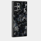 Samsung Galaxy case in black genuine forged carbon fiber with blue metallic flake accents by Karbon Technik.